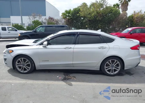 2019 Ford Fusion Hybrid Titanium z USA, uszkodzony, nr VIN 3FA6P0RUXKR118528